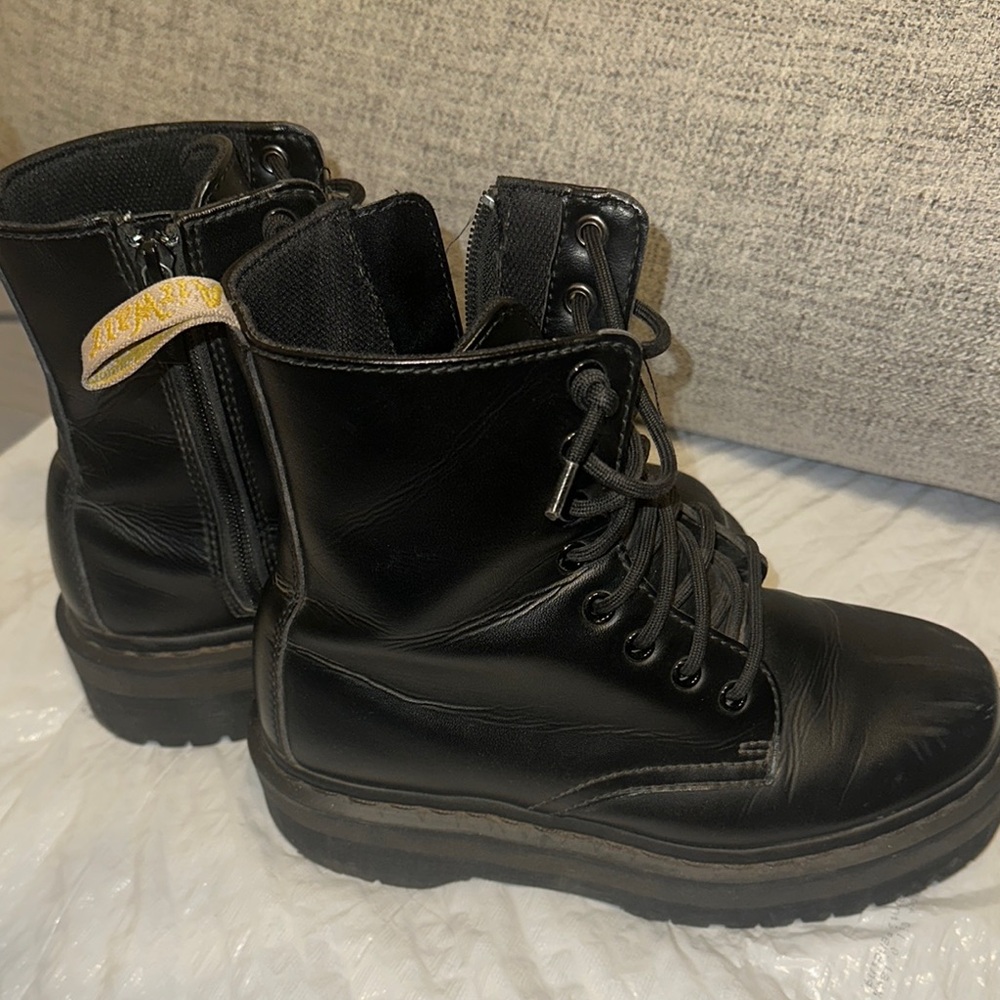 Sleek Brown and Black Ankle Booties with Buckle Straps